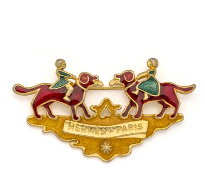 HERMES Paris
Broche en métal doré et émail...
