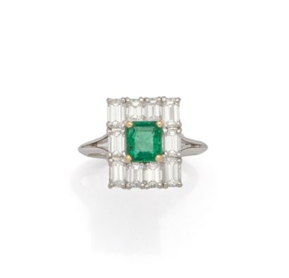Bague en or deux tons 18K (750/1000) centrée...