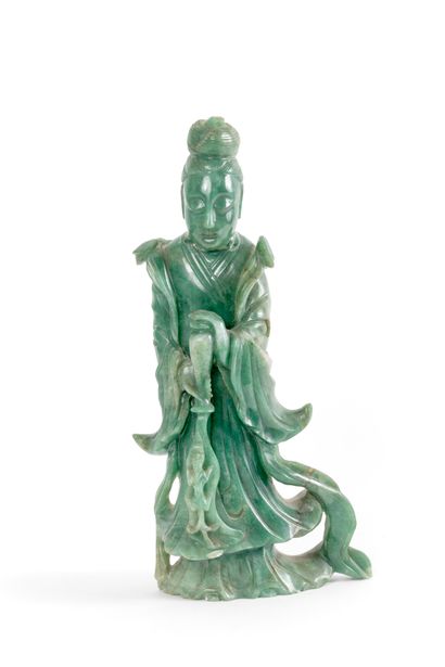 CHINA, 20th century 
Large jadeite statuette...