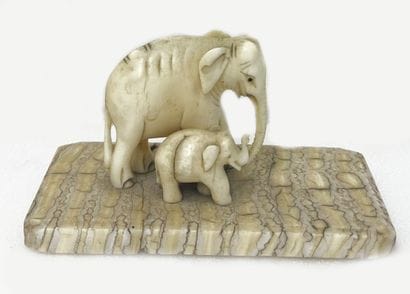20th century work
Elephant and calf in bone
Hard...