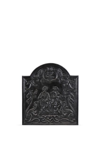 Cast-iron fireback decorated with a musician,...