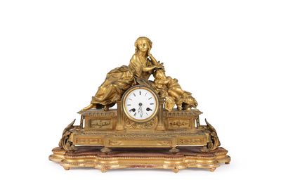 Gilt bronze mantel clock decorated with a...