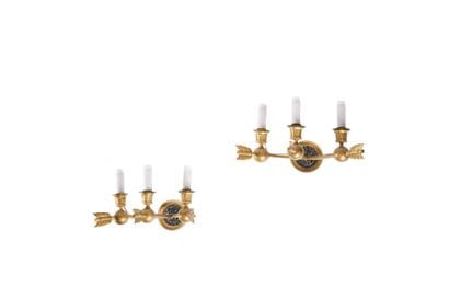 Pair of sconces with three-light arrows and...