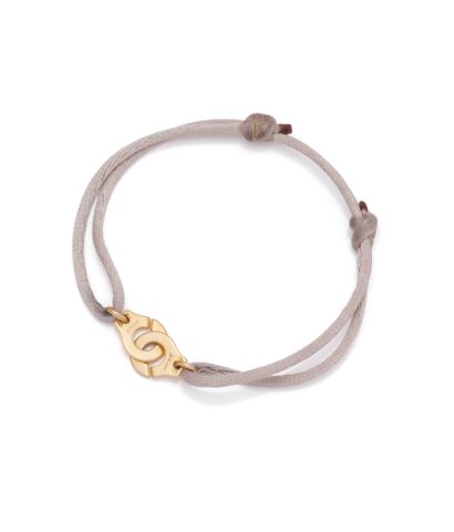 DINH VAN
Bracelet cordon beige muni d'un...