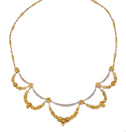 18K (750/1000) yellow gold and silver drapery...