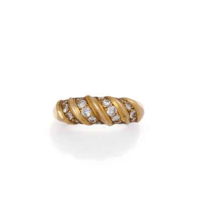 Bague jonc en or jaune 18K (750/1000) à motifs...