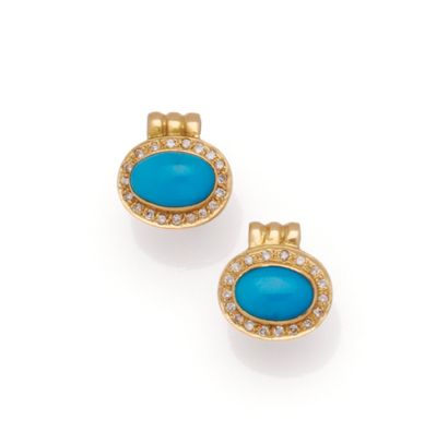 Paire de puces d'oreilles en or jaune 18K...