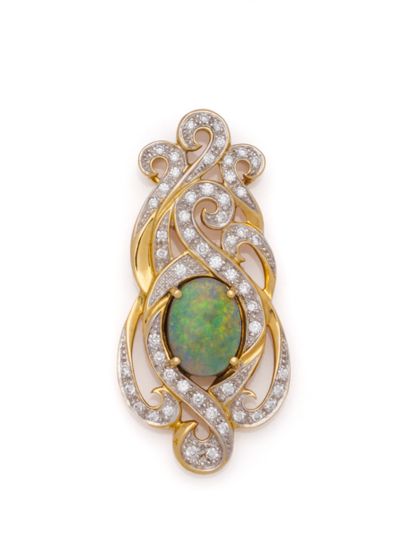 Important pendentif en or jaune 18K (750/1000)...