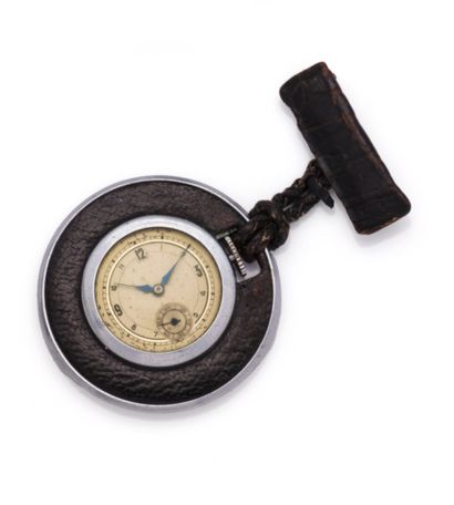 ANONYMOUS
Metal and leather brooch watch,...