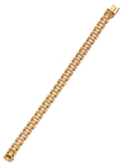 Bracelet articulé en or jaune 18K (750/1000)...