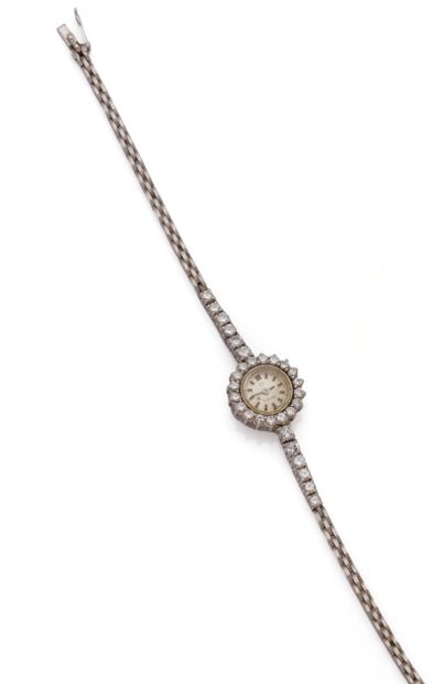 OMEGA
Ladies' wristwatch in 18K (750 thousandths)...