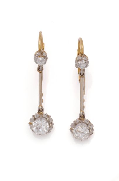 Pair of 18K (750/1000) yellow gold and platinum...