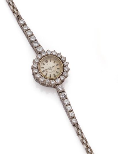 OMEGA
Ladies' wristwatch in 18K (750 thousandths)...