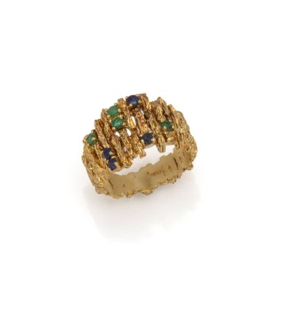 Bague en or 18K (750/1000) à l'anneau moderniste...