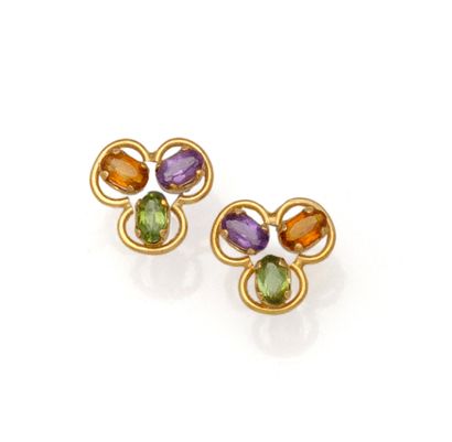 Paire de puces d'oreilles en or 18K (750/1000)...