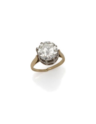 Solitaire en or 18K (750/1000) et platine...