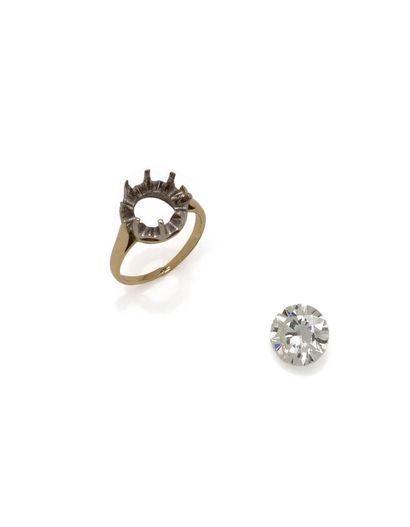Solitaire en or 18K (750/1000) et platine...