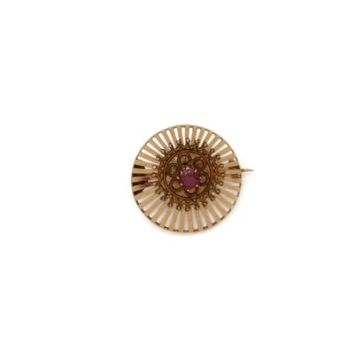 Petite broche ronde en or 18K (750/1000)...
