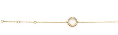 Bracelet en or jaune 18K (750/1000) centré...