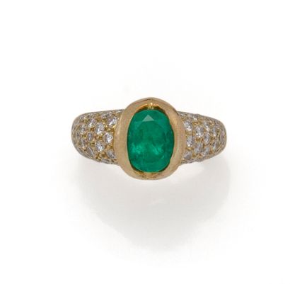 Bague jonc en or 18K (750/1000) ornée d'une...