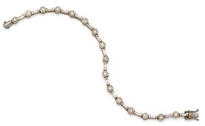 Bracelet ligne en or gris 18K (750/1000)...