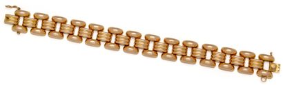 Bracelet tank en or 18K (750/1000) articulé...