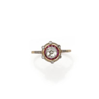 Bague en or 18K (750/1000) et platine (850/1000)...