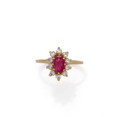 Bague marguerite en or 18K (750/1000) ornée...