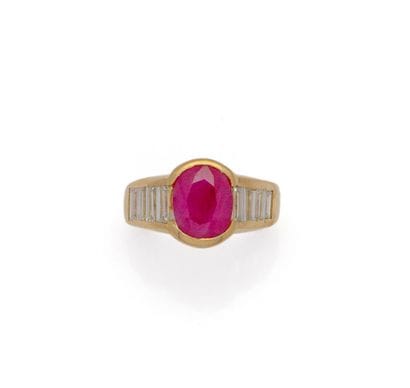 BAGUE en or jaune 18K (750/1000) centrée...