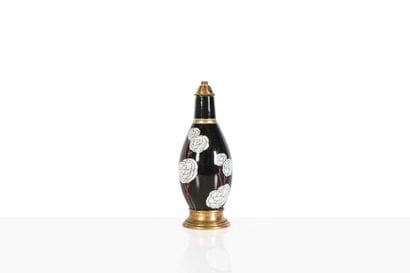ROBJ 

Pied de lampe en porcelaine et monture...