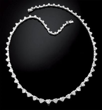 Collier or gris serti de diamants taille...