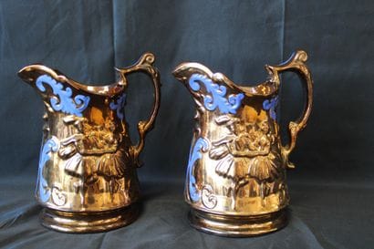 Pair of copper-effect decanters/pitchers
