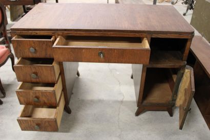 Dark wood desk with four drawers on the left,...