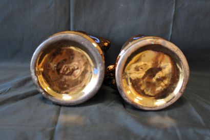 Pair of copper-effect decanters/pitchers