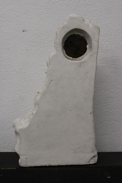 Sculpted plaster clock featuring a child...