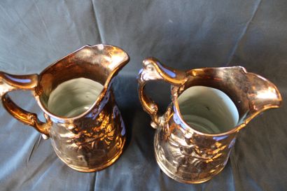 Pair of copper-effect decanters/pitchers