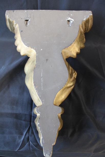 Gilded wood console with angel