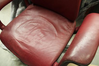 red leather office chair with castors
