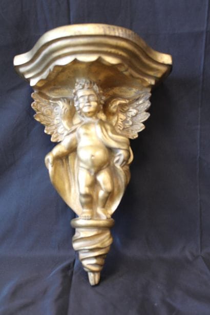 Gilded wood console with angel