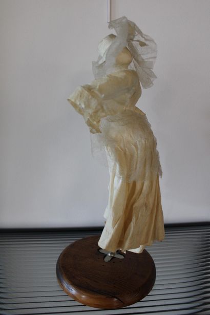 Paper figure on stand 
