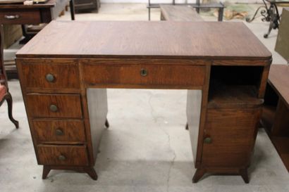 Dark wood desk with four drawers on the left,...