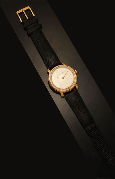 
IWC 

Montre-bracelet. Boîtier rond en or...