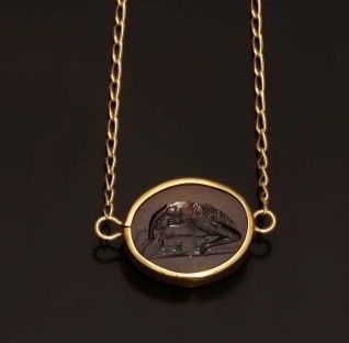 Collier en or jaune 18K (750 °/°°) orné d'une...
