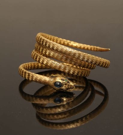Bracelet serpent en tressage d'or jaune 18K...