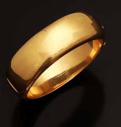 Large bracelet jonc en or jaune lisse 18K...