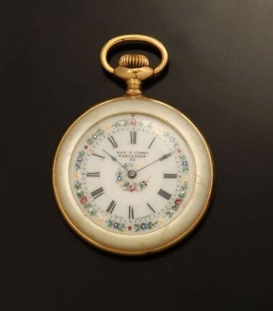 KAY & COMPEX 

Montre de poche en métal doré...
