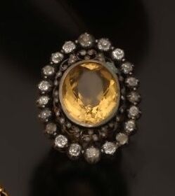 Large bague en or 18K (750 °/°°) et argent...