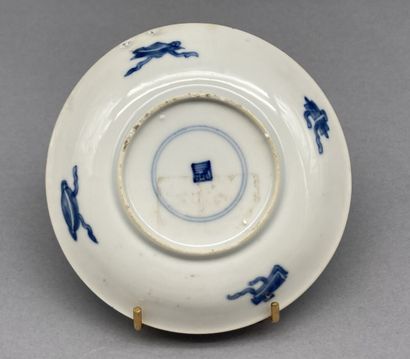 Small tea bowl and its saucer in blue and...