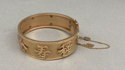 Bracelet rigide articulé en or 18 K (750...