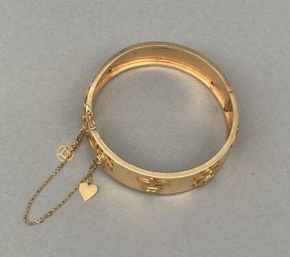 Bracelet rigide articulé en or 18 K (750...